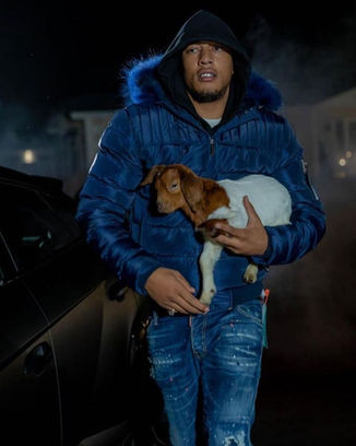 dutch holding a goat