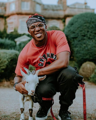 ksi holding a goat
