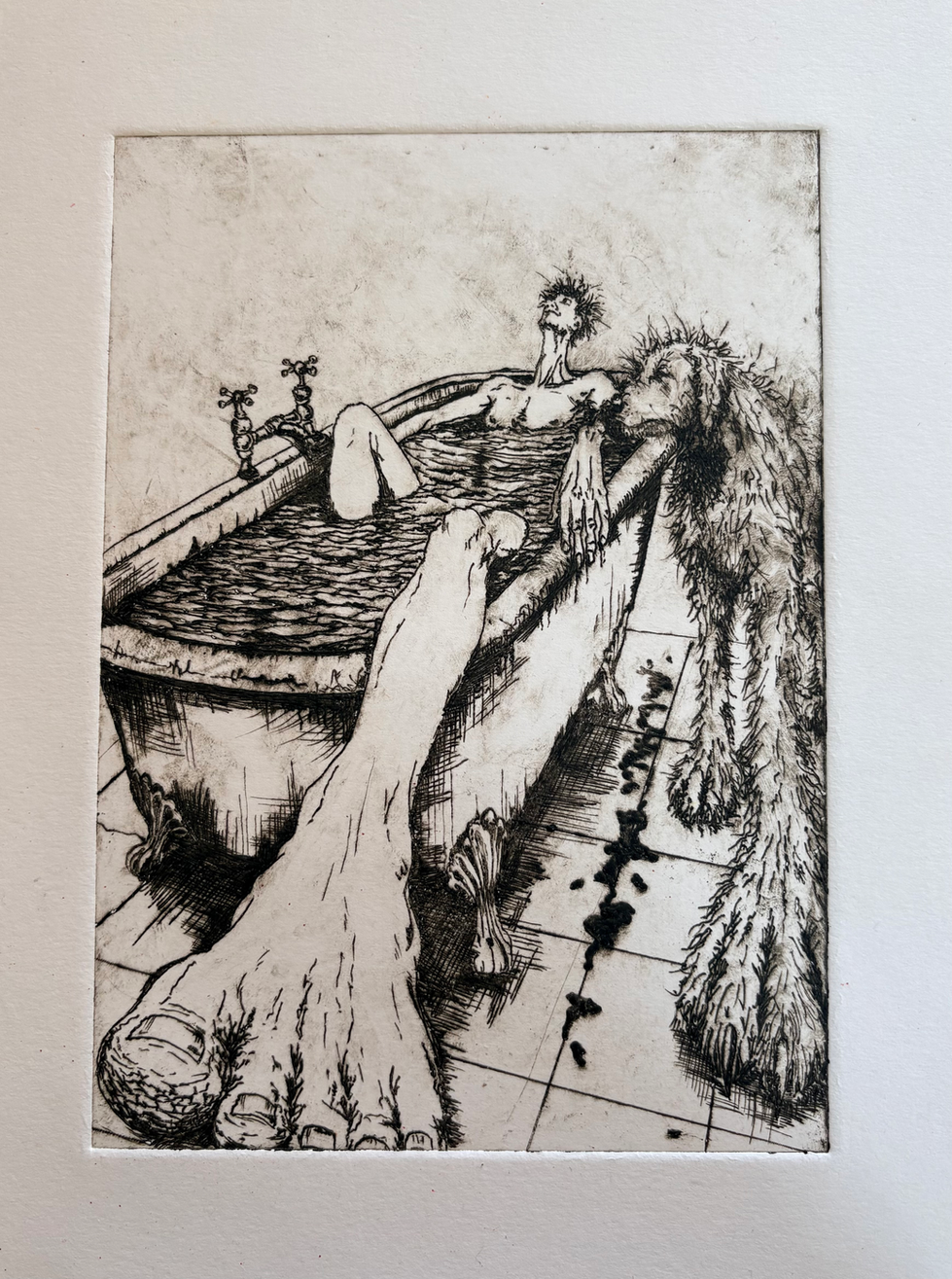 Black-and-white drypoint print of a lanky man relaxing in a bathtub with one oversized foot stretching towards the viewer, while a large shaggy Irish wolfhound leans over the side of the bath beside him.