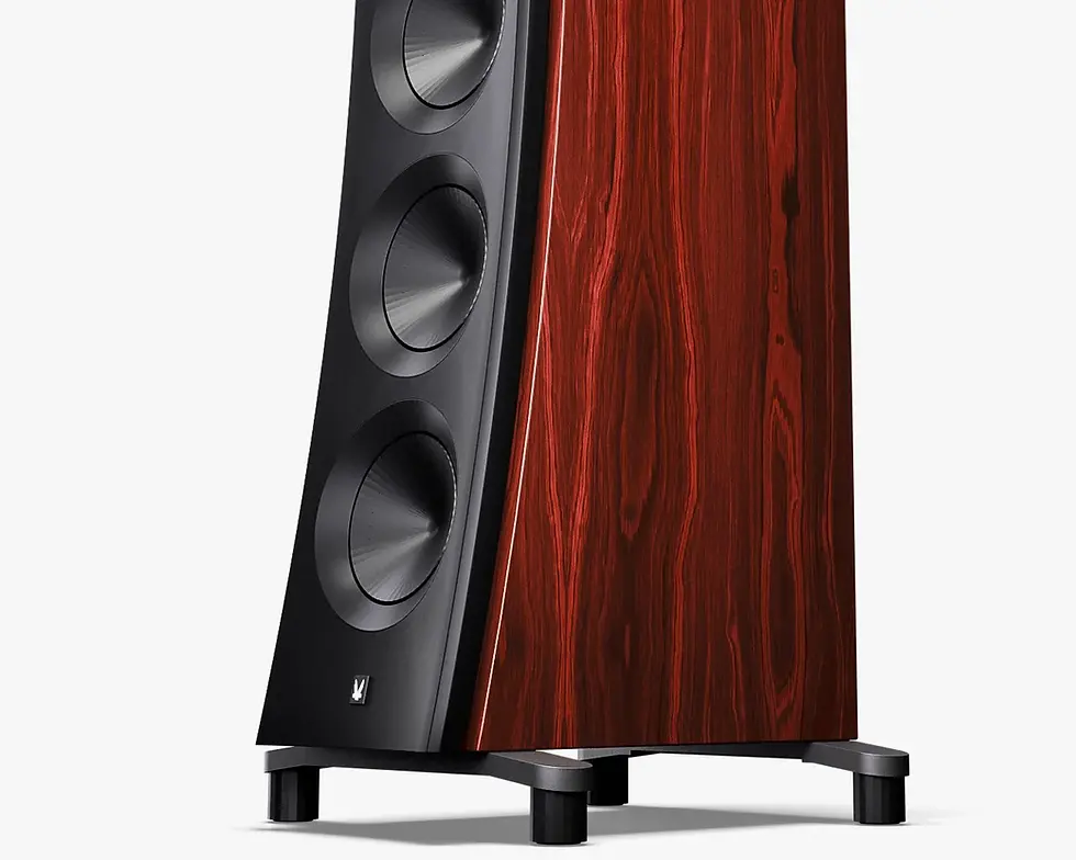 Wooden speaker with a sleek black front panel and three round black drivers. The rich wood grain texture adds elegance. Minimalist design.