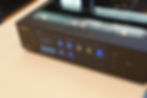 EverSolo hi-fi music player on a table, showing a touchscreen with app icons and Tori Amos album art.