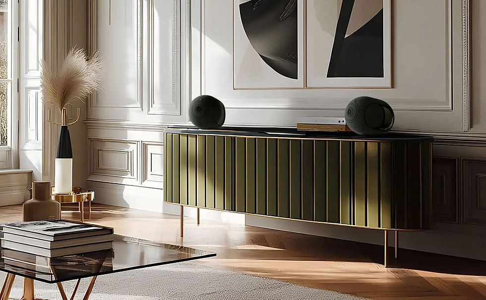 Chic living room with an olive green sideboard, decorative vases, and abstract art. Sunlight casts soft shadows on the parquet floor.