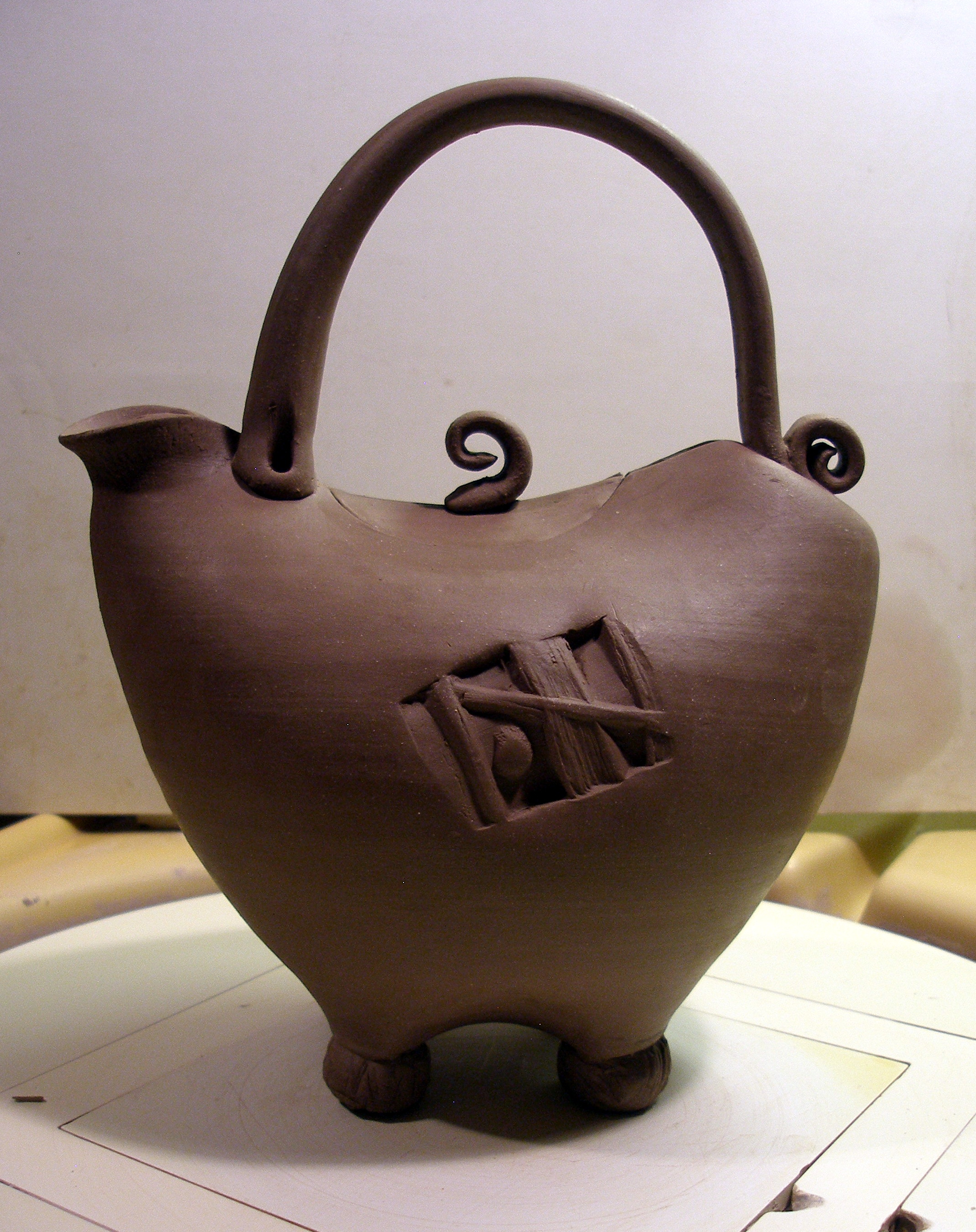 Teapot, leather hard stage.