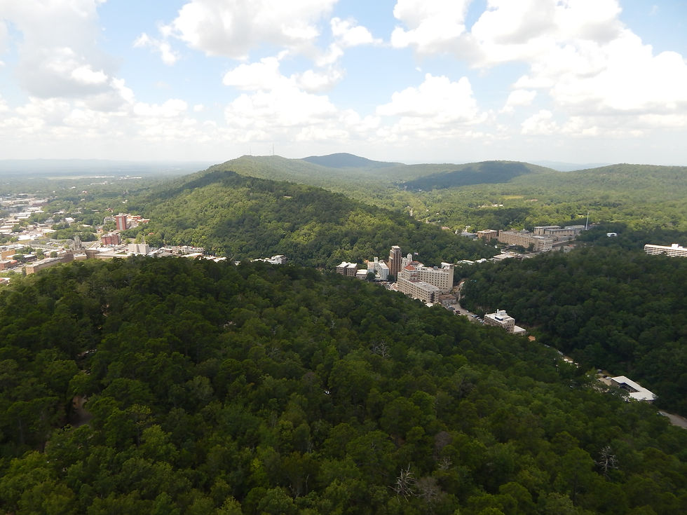 An aerial photo of Hot Springs, AR under a cloudy sky