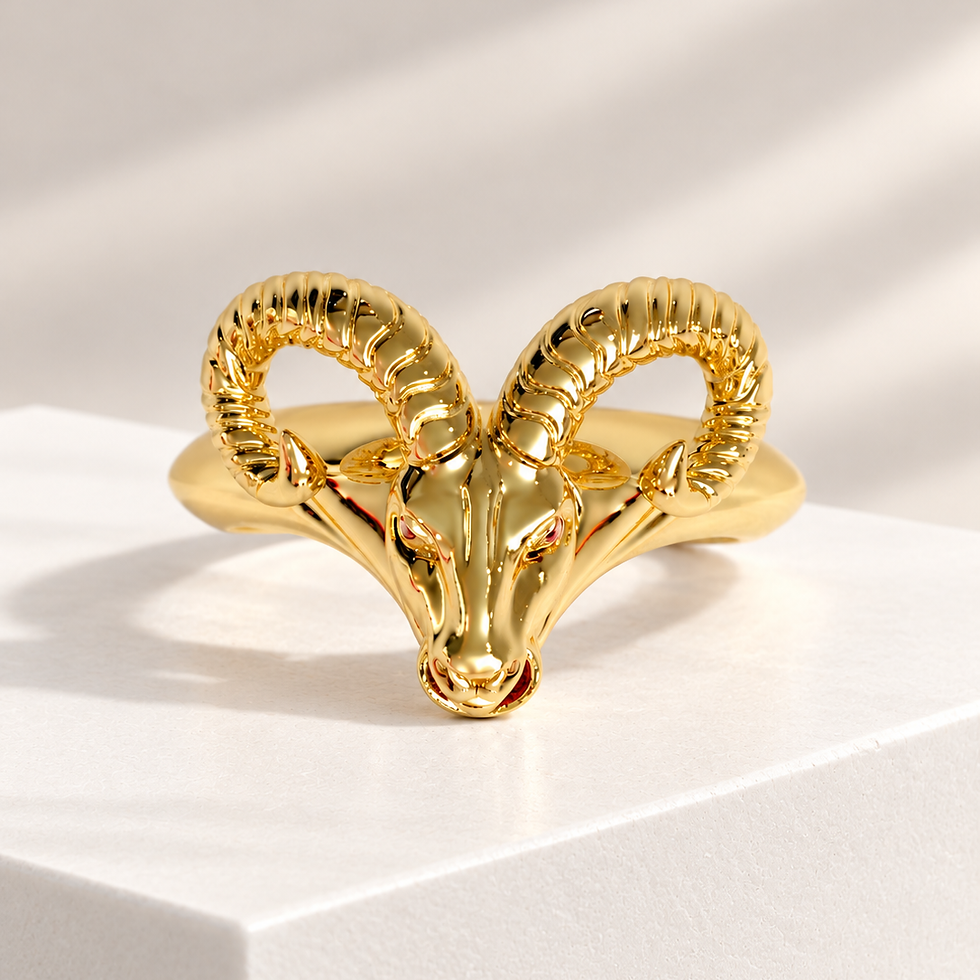 REV gold ram head ring displayed on a minimalist jewelry pedestal