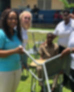 High angle view of a child studying with books and a laptop