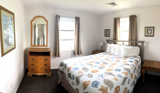 One-Bedroom Cottages feat. 1 Queen Bed.