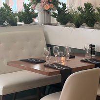 Elegant dining table at The Grove with floral centerpiece