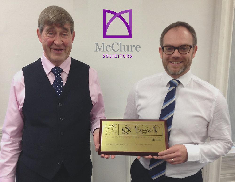 McClure Managing Director : Andrew Robertson and Director Stewart Moore with the High Street Firm of the Year Award 2017!