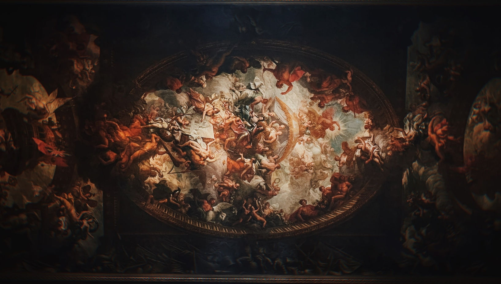 Ornate classical ceiling painting with many figures
