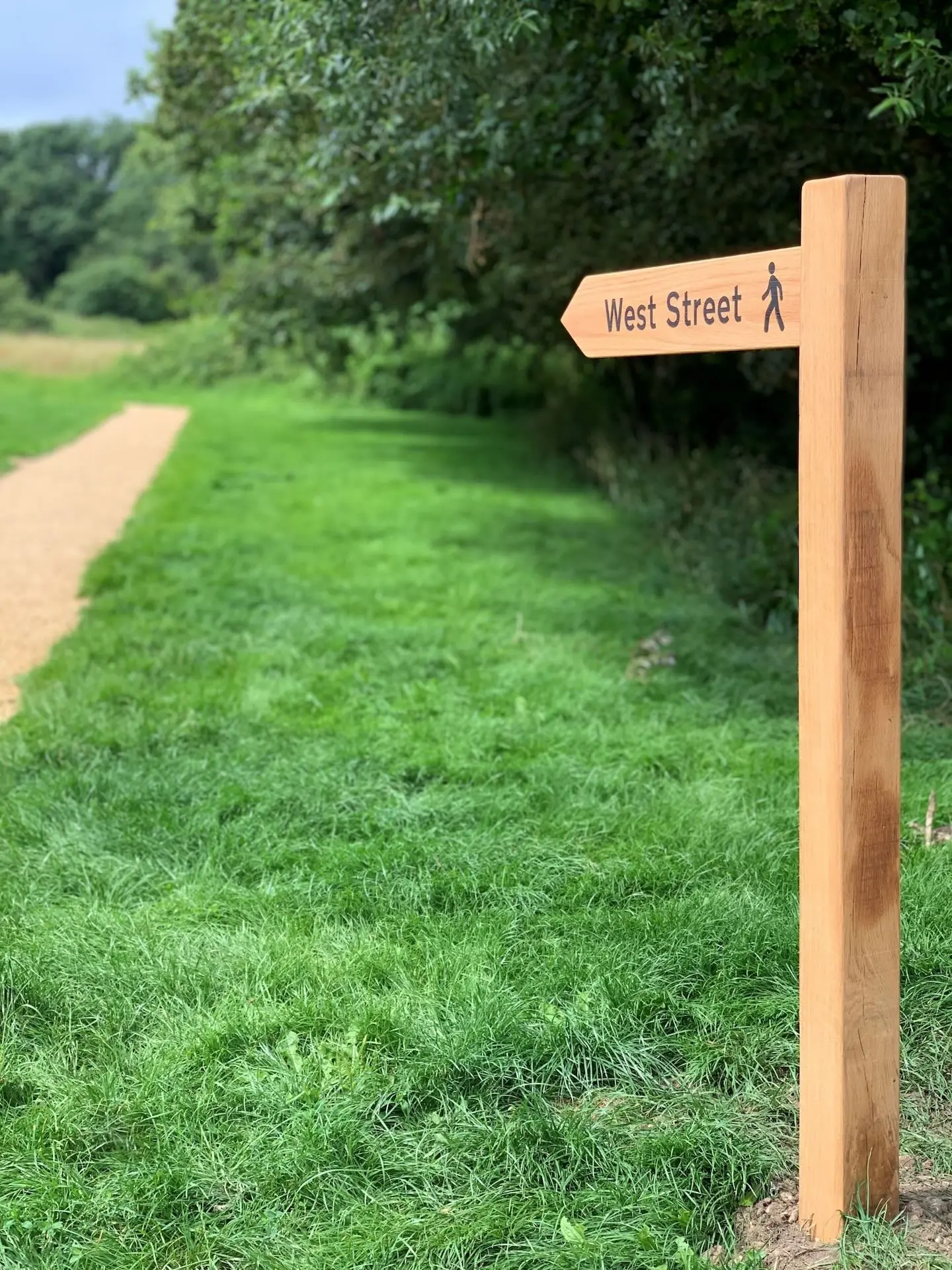 A signpost leading to West Street