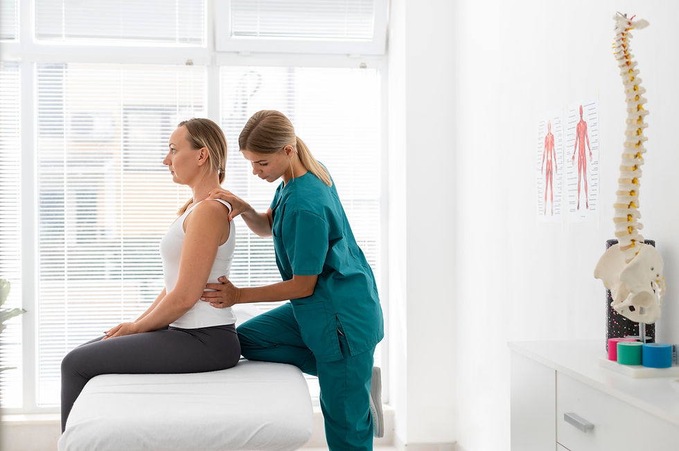 young-physiotherapist-helping-patient-with-back-problems.jpg