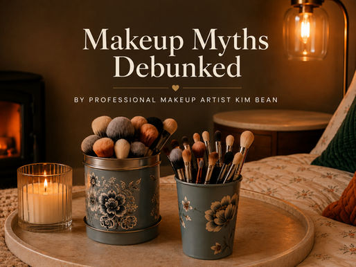 Cozy editorial beauty graphic featuring makeup brushes on a marble tray beside a fireplace and warm bedroom lighting with the title Makeup Myths Debunked by Professional Makeup Artist Kim Bean.