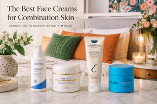 Best face creams for combination skin, including Embryolisse, Skinfix Barrier+, Biologique Recherche Crème VIP O2, and AESTURA ATOBARRIER365 Lotion arranged on a marble surface in a cozy bedroom setting.
