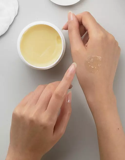 Hand cream being rubbed into hands