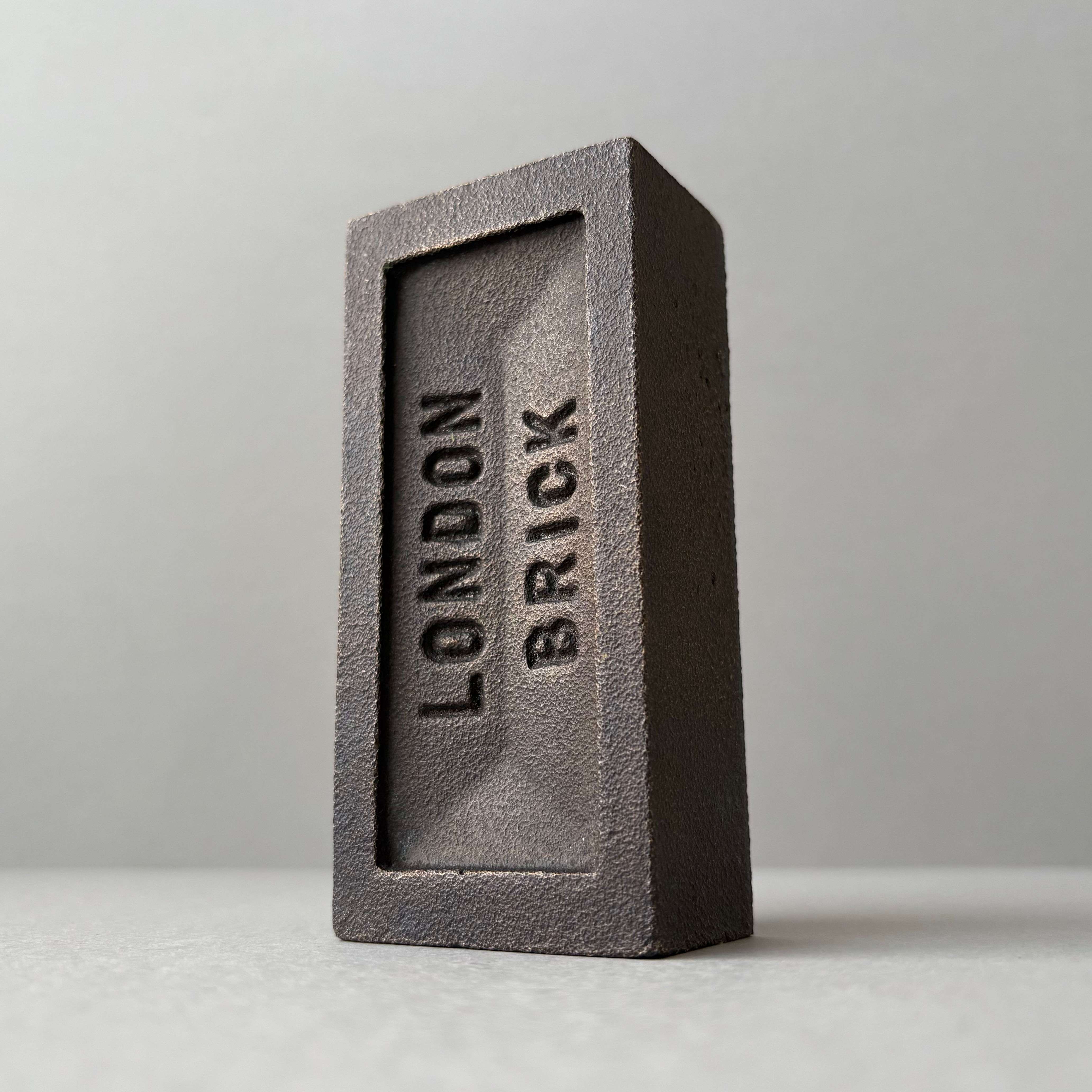 patinated bronze brick