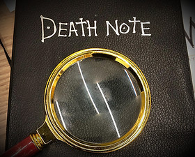 The death note. It's a diary of an assassin. Inspired by traditional religion, where a shinigami uses a divine book to take life. by simply writing the name of the person due to die, the note becomes a death note. can be found only at Trapped Guelph escape rooms.
