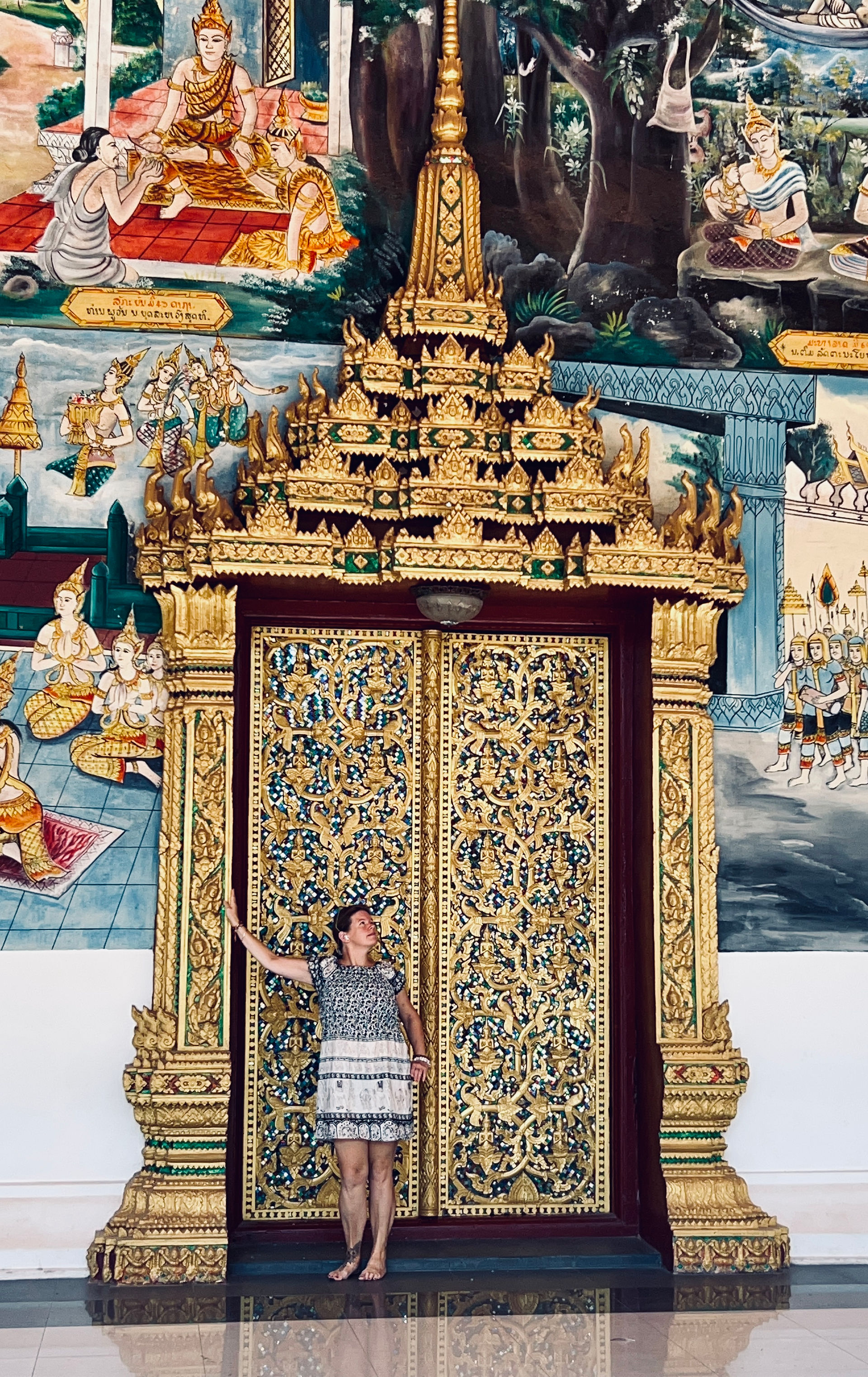 Posing in front of the Wat Inpeng Temple Door in Vientiane