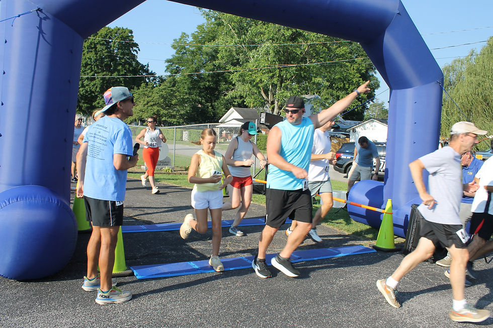 Runners in the Run for Joe 5K event cross the starting line as the race began last Saturday to honor Decherd native, Joe Bach.