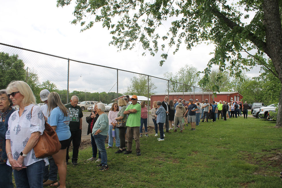 Community members wait patiently in a line that wrapped around the community center at the Belvidere Volunteer Fire Department Fish Fry last Saturday, held at the Belvidere Community Center.