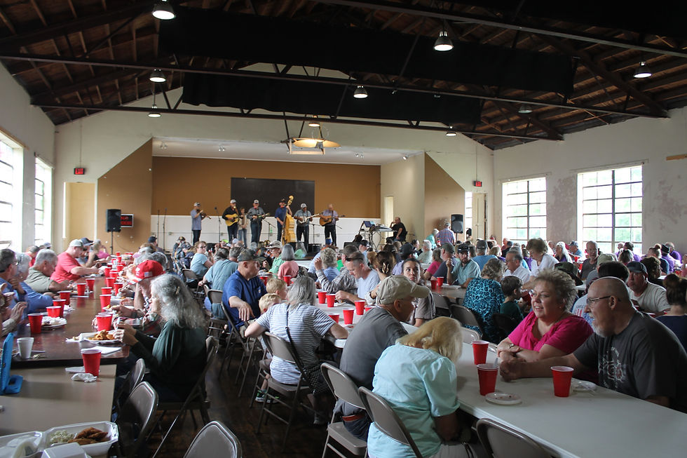 Attendees of the Belvidere Volunteer Fire Department Fish Fry gather in the Community Center to enjoy musical entertainment and all you can eat fish.