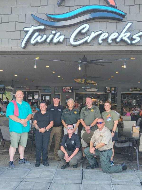 Officers from Franklin County Sheriff's Office, Cowan Police Department, and Tennessee Highway Patrol pause for a picture during their Tip-A-Cop event held last month at Drafts and Watercrafts. All tips received by law enforcement were donated to the Special Olympics. Picture Provided.