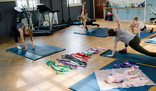 Mums warming up in exercise class.