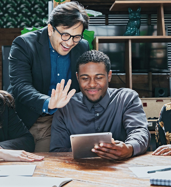 cheerful businesspeople connecting with clients