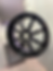 Glossy black 8-spoke wheel with fresh powdercoating.