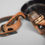 Thumbnail: Dienstglas Bakelite ocular cover + neck strap