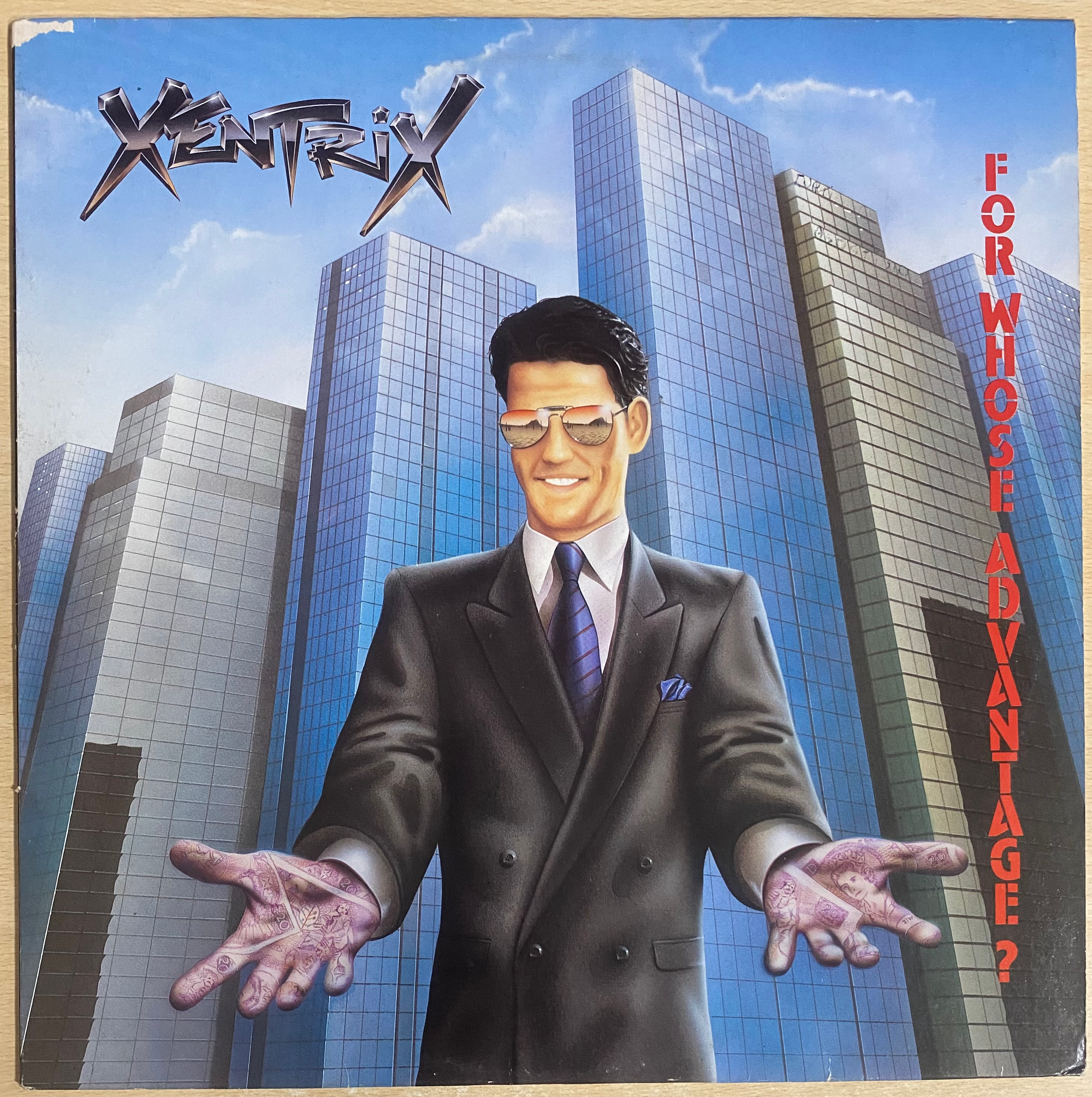 Copertina album Xentrix, For Whose Advantage?, uomo in giacca