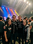 A_group_of_young_adults_facing_a-0.png