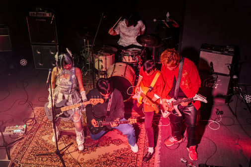 Top-down shot of Hsachiko Got Daddies performing with an expanded lineup including guest guitarist daddy Caleb at Moshi Rock Ryu 2025.