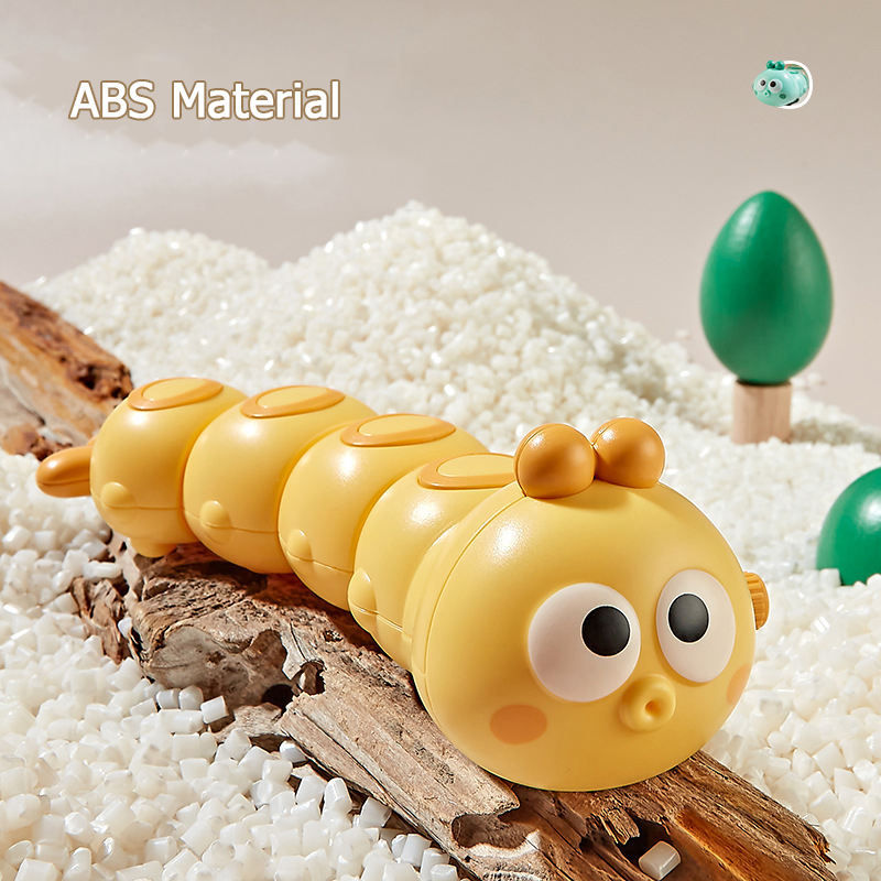 Miniatura: Brinquedo de corda divertido e colorido com animais, minhoca e réptil rastejante