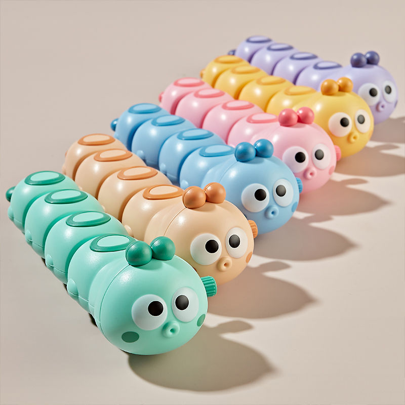 Miniatura: Brinquedo de corda divertido e colorido com animais, minhoca e réptil rastejante