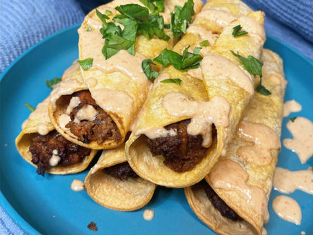 Vegan Taquitos with Spicy Vegan Cheese Sauce