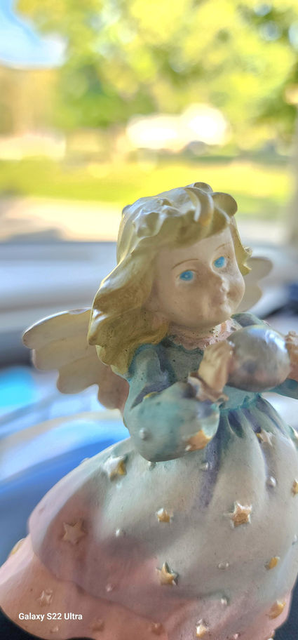 angel figurine side view