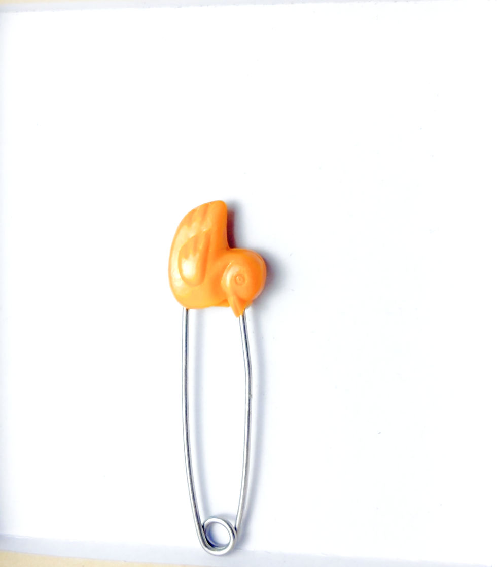 Vintage 2.5" plastic-head baby diaper safety pins. Dating back to the 1960s and 70s, 1 Orange