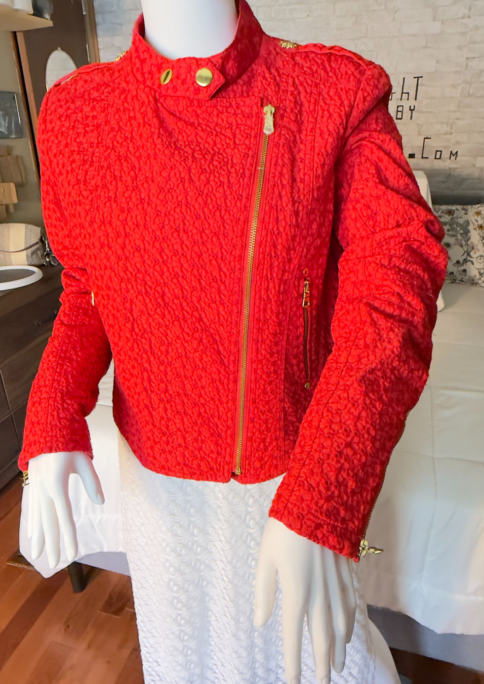 Green with Envy Red Eyelet Lace Moto Jacket with zippered front and side pockets.