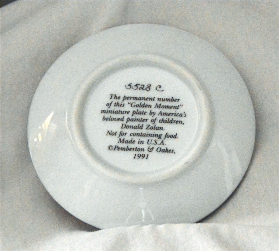Back of a Pemberton & Oakes Mini Collector Plate showing the firing number and released date 1991.