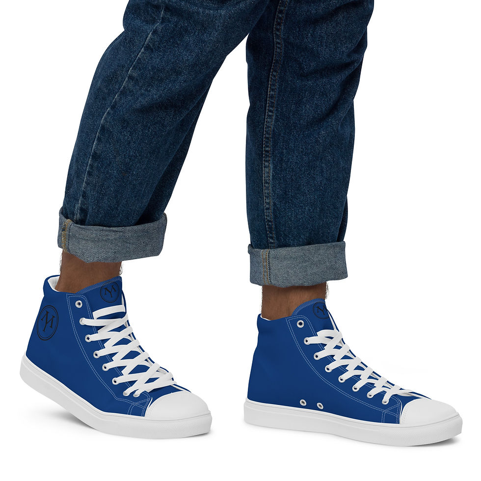 Thumbnail: Person wearing royal blue high-top canvas sneakers