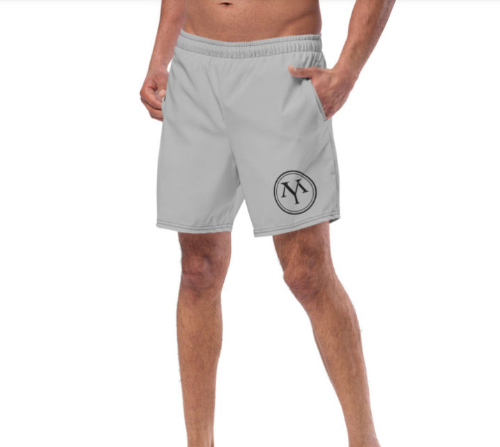 Model in light gray shorts with logo