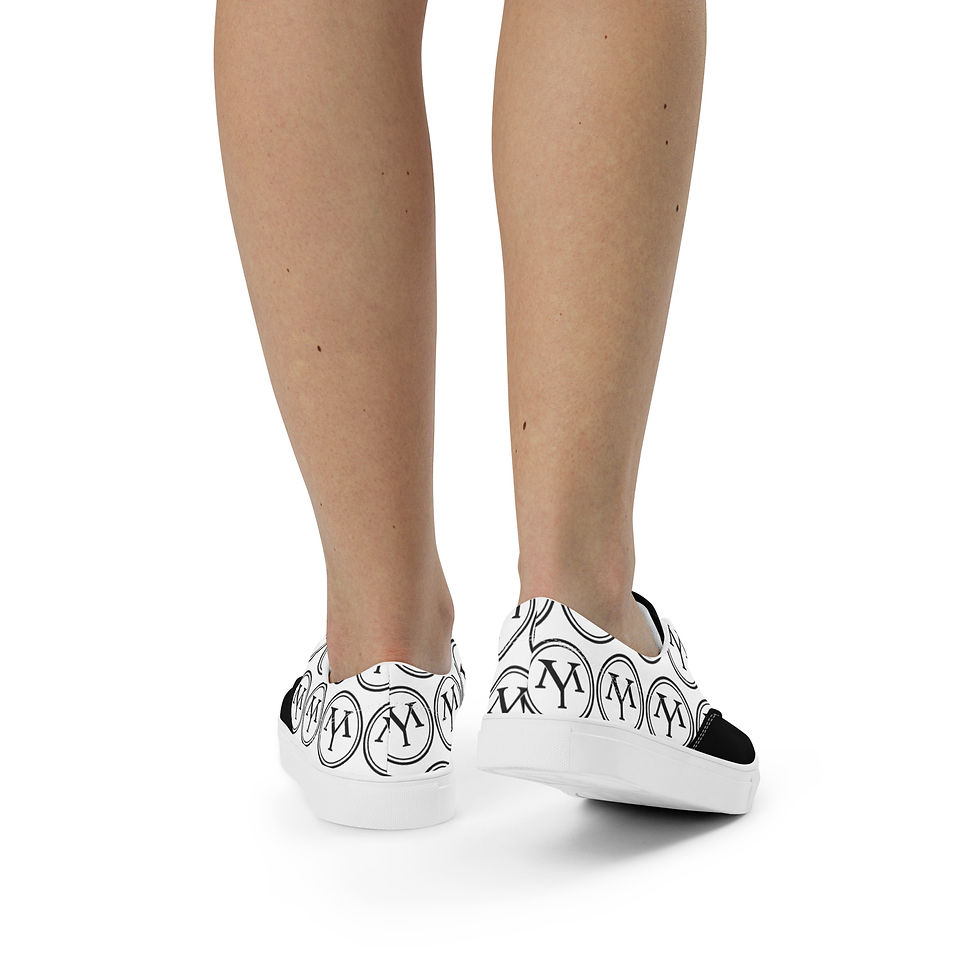 Thumbnail: Person's legs in YM Drip Letter Shirt shoes