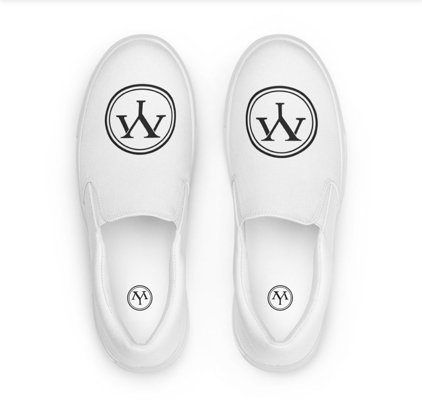 White canvas slip-on shoes with logo