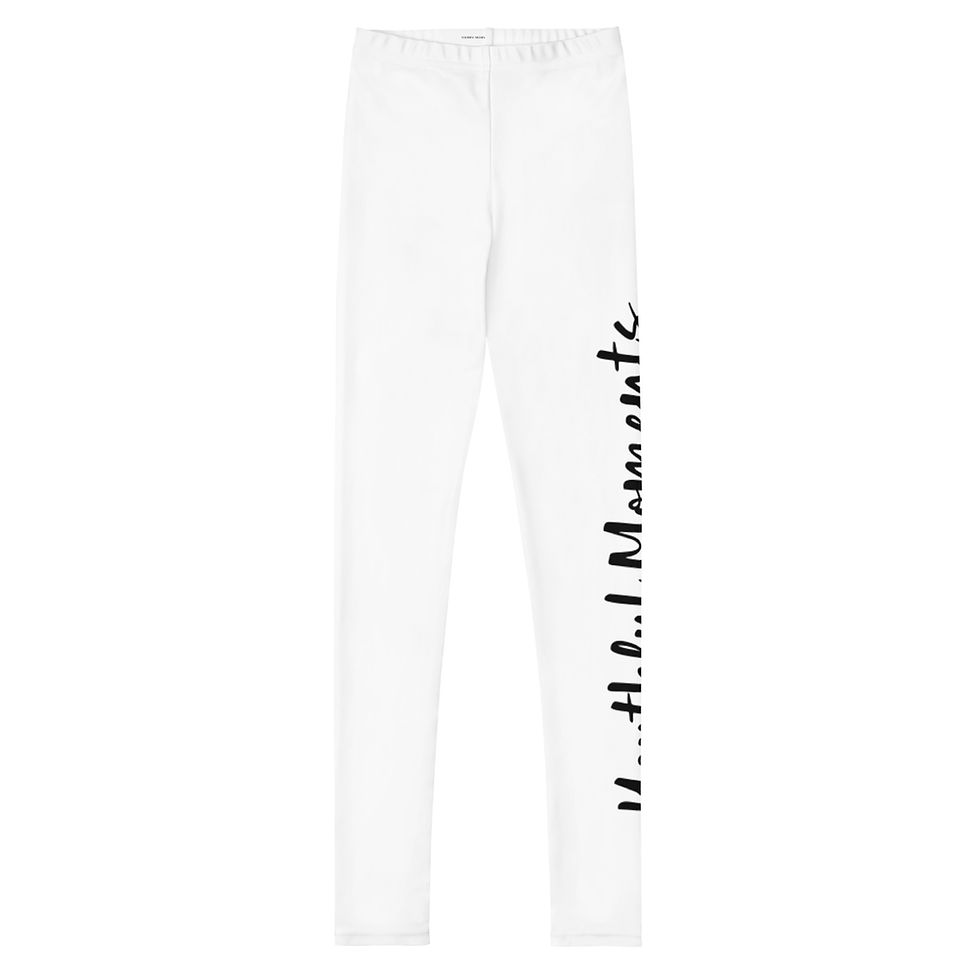 White leggings with "It's all about the vibe" text
