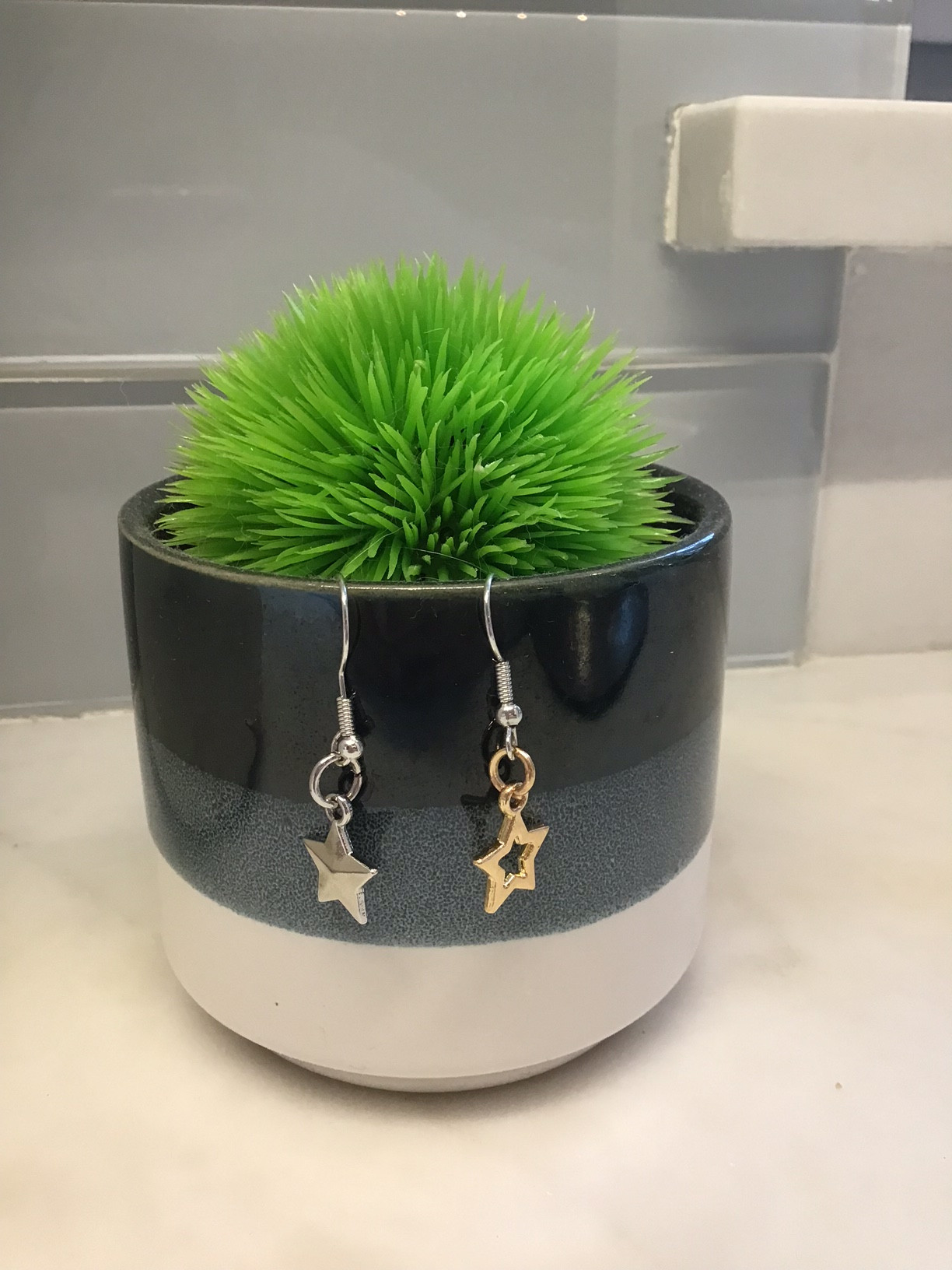Silver and Gold mismatched star earrings
