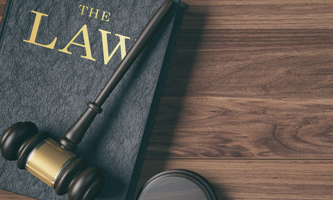 low-key-filter-wooden-judge-s-gavel-law-book-golden-scale-wood-background.jpg