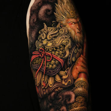 Monkey King tattoo on upper arm by Ciel, Wild Crane Tattoos, GTA