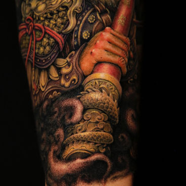 Monkey King tattoo on upper arm by Ciel, Wild Crane Tattoos, Markham