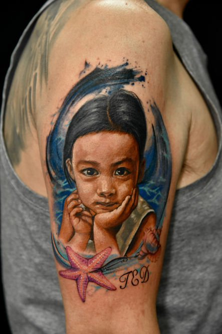 Realism portrait tattoo on upper arm by Ciel, Wild Crane Tattoos, GTA